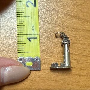 Silver light house charm
